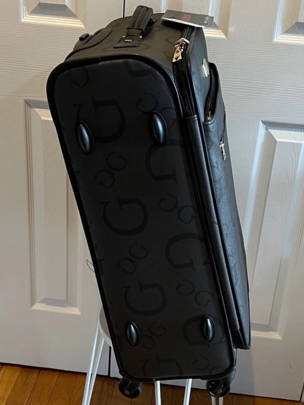 GUESS Logo Debossed Black Rolling Suitcase 24 “